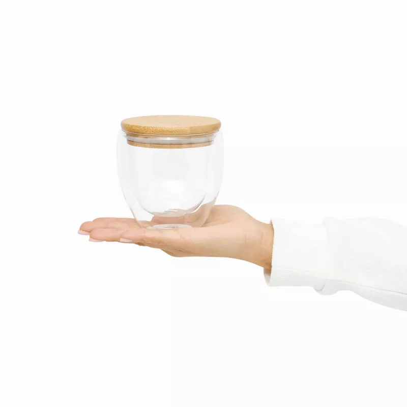 Dwuścienna szklanka z pokrywą z bambusa. Przezroczysta, odporna na temperaturę, o pojemności ok. 250 ml - transparentny (56-0304450)