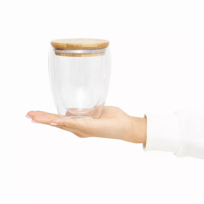 Dwuścienna szklanka z pokrywą z bambusa. Przezroczysta, odporna na temperaturę, o pojemności ok. 250 ml - transparentny (56-0304451)