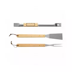 centered on the handle of the grill tong