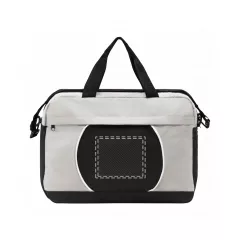 centered on the black part of the front pocket