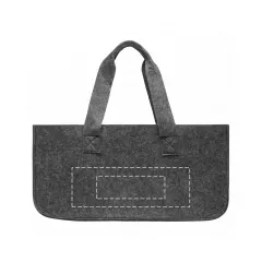 centered below the carrying straps on the back