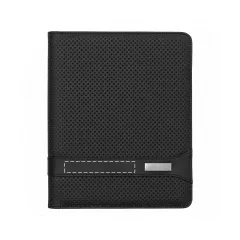 on the leather strap next to the metal plate