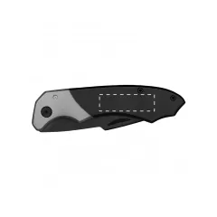 centered on the side without clip